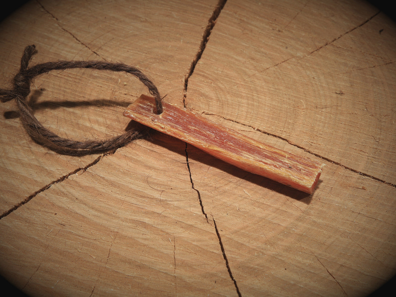 Pinewood stick with string