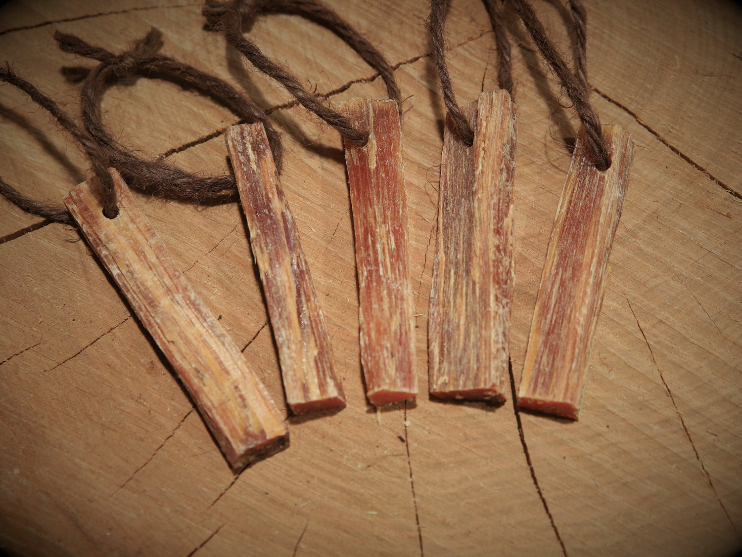 Pinewood stick with string
