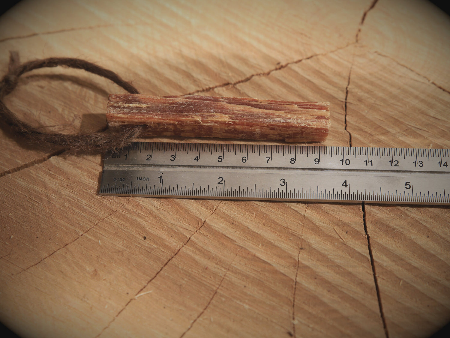 Pinewood stick with string